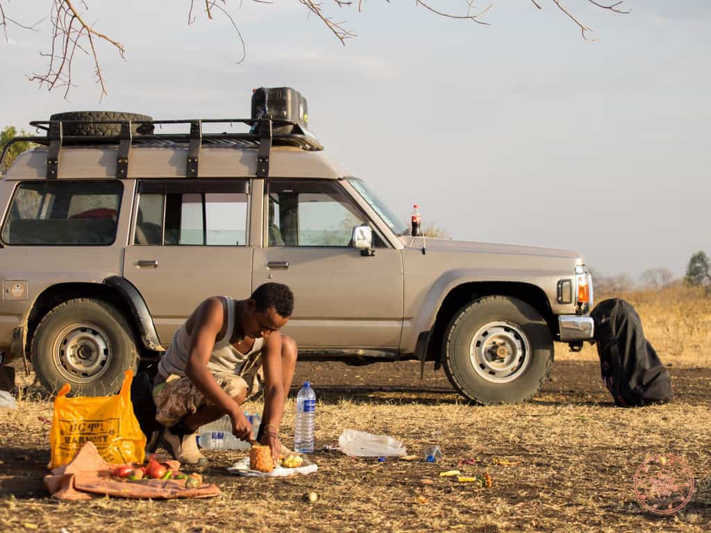 Lala from Jinka Preparing Food in ethiopia travel guide omo valley
