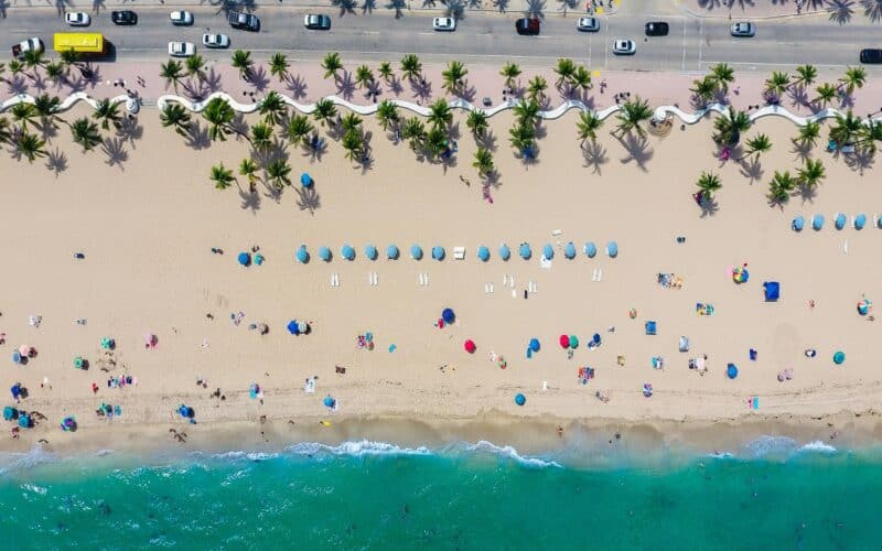 aerial view of beach goers at a beach in fort lauderdale