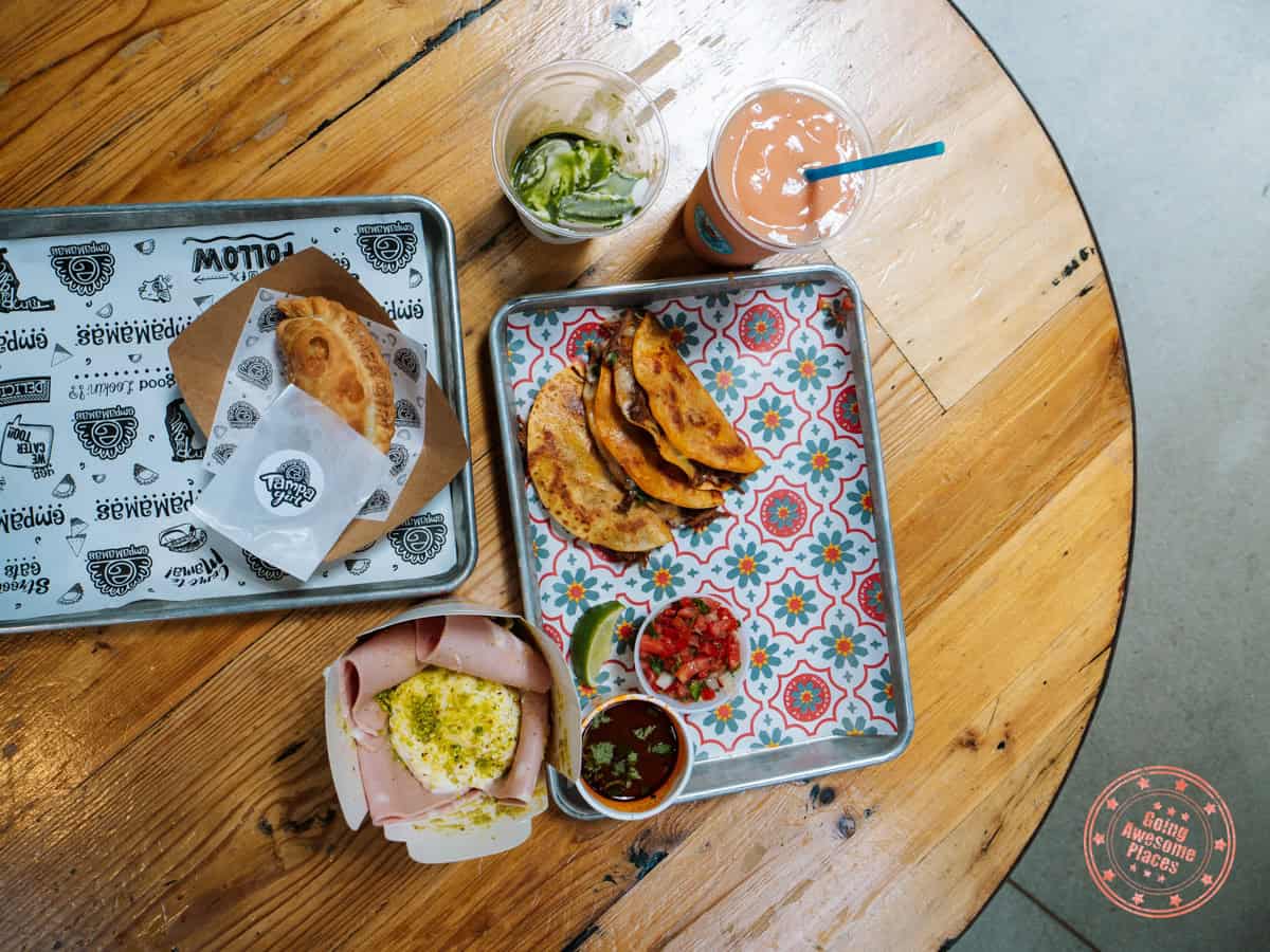 spread of meal ordered from food hall at tampa armature works