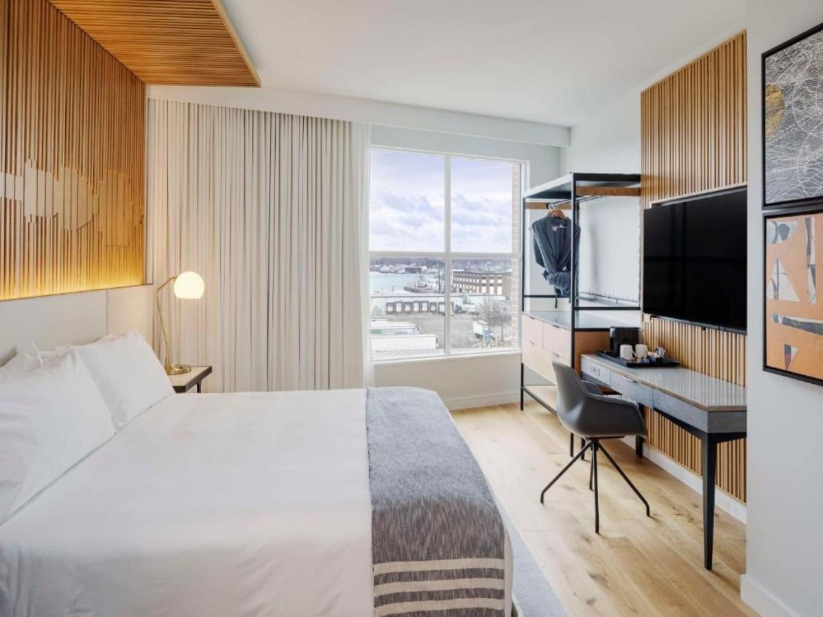 one bedroom king suite with waterfront view at canopy by hilton portland waterfront