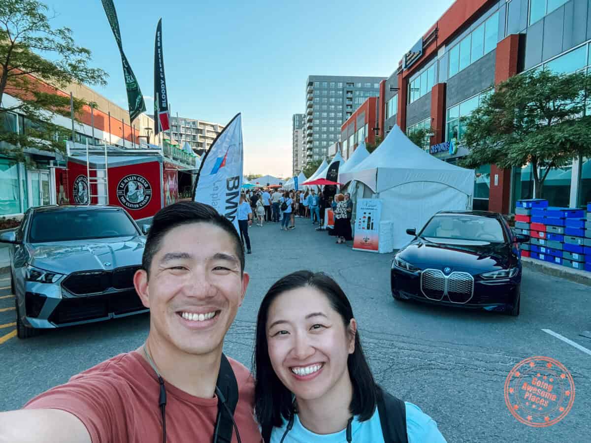 couple at wine and spirits festival in laval in the summer