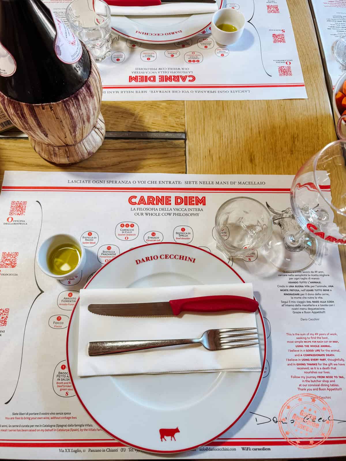 cutlery and placemat with carne diem at the antica marcelleria cecchini