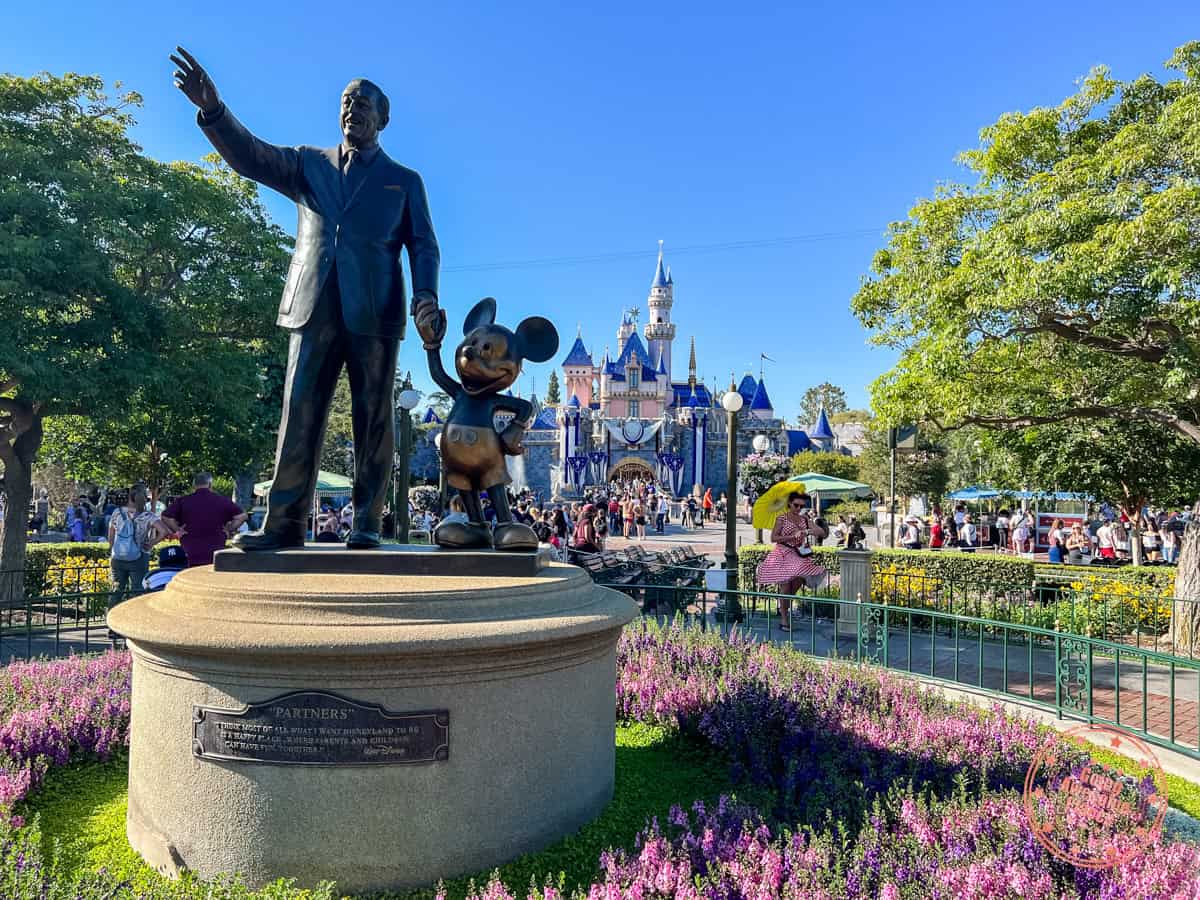 disneyland california entrance with walt and mickey statue by main street