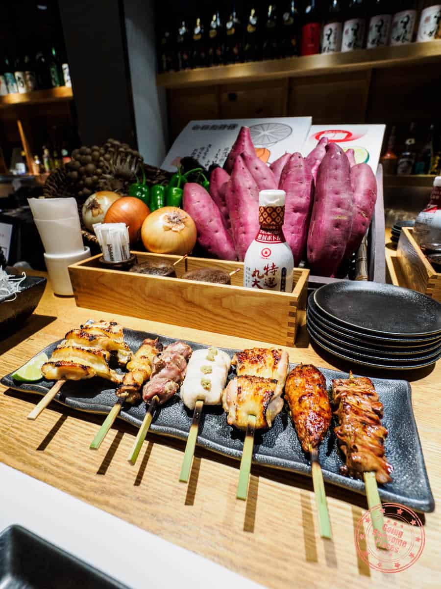 domannaka izakaya restaurnat with yakitori sampler dish in tokushima