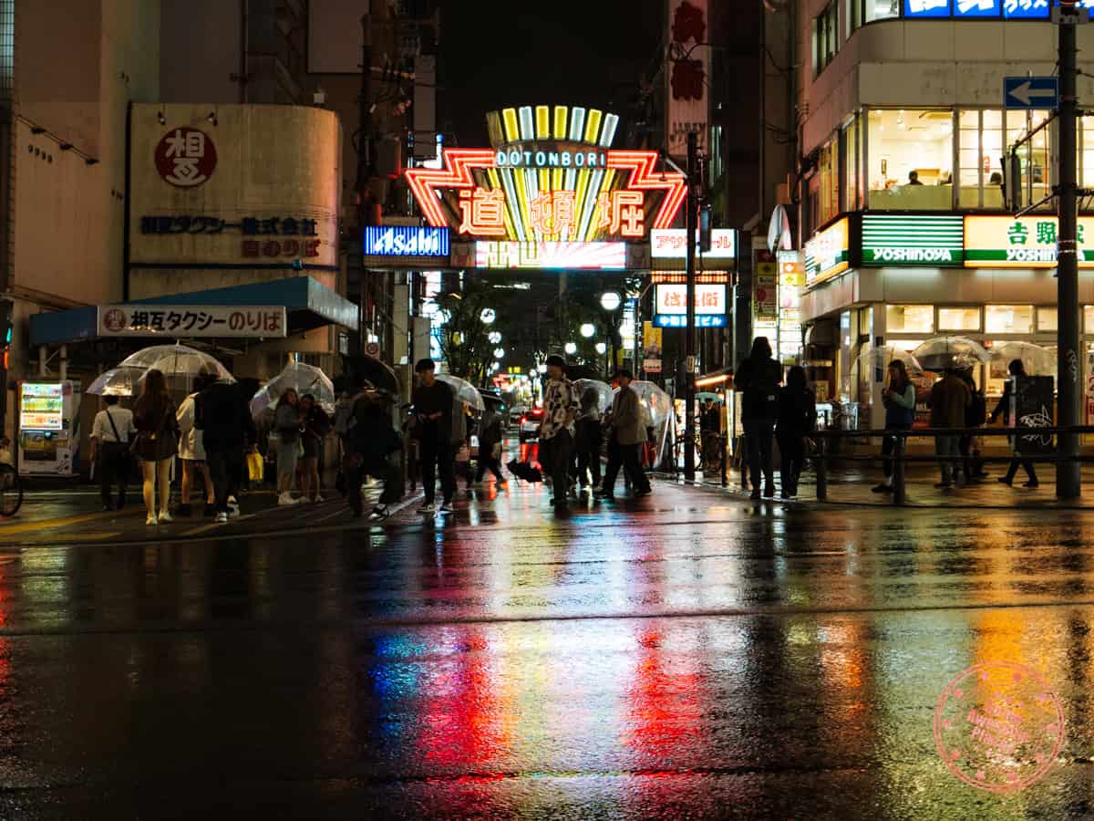 dotonbori neon signage when raining