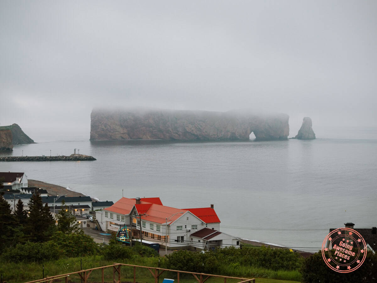 foggy sunrise in perce over perce rock
