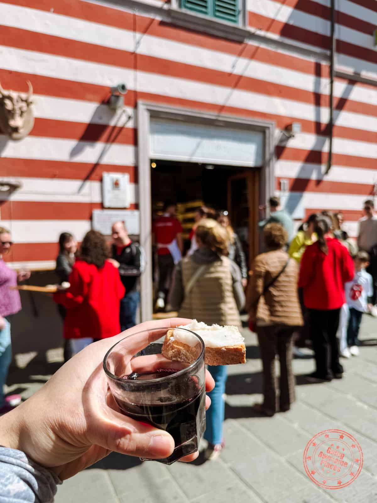 free appetizers wine and bread outside dario cecchini restaurant in panzano tuscany
