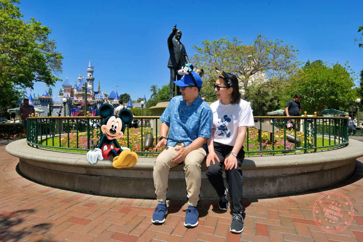 william from going awesome places sitting with mickey mouse in photopass at disneyland