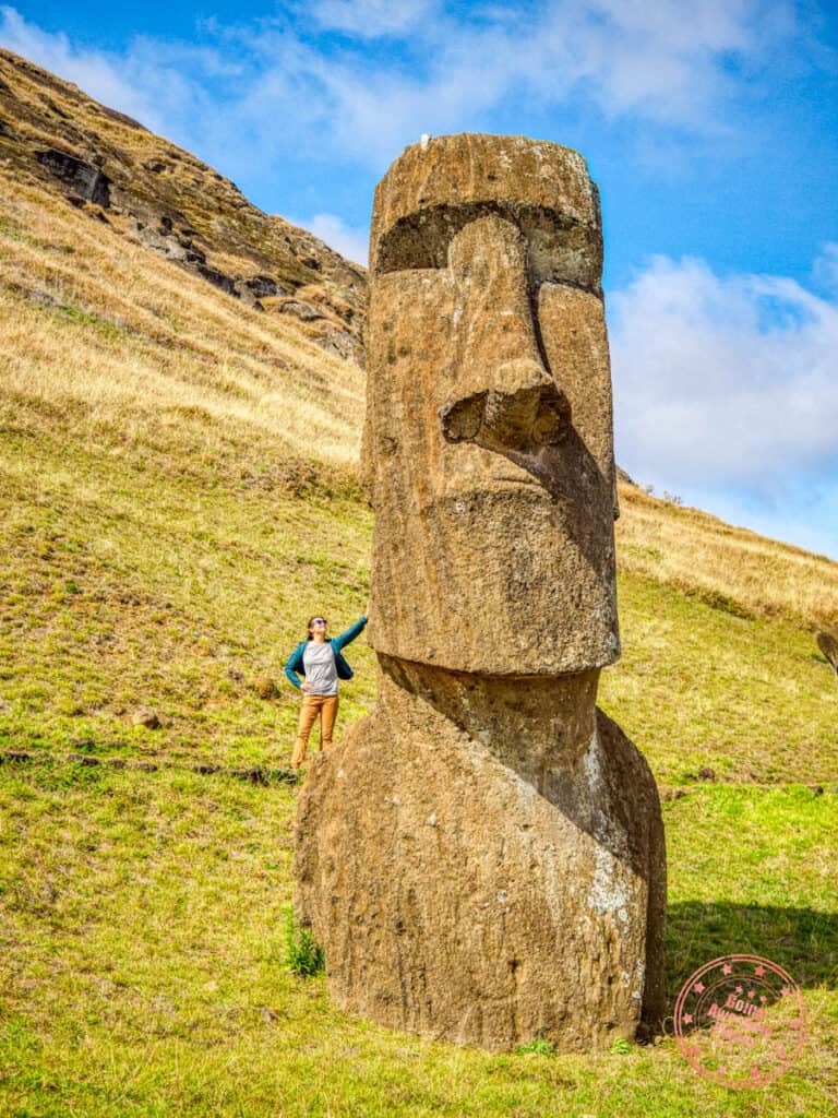 holding up moai in rano raraku easter island