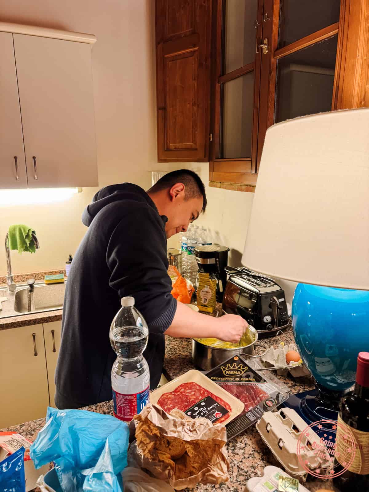 jia cooking dinner in our tuscan villa