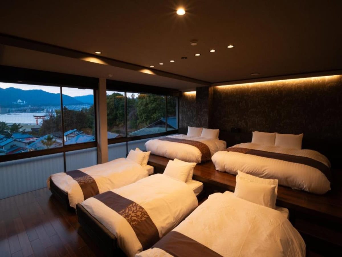 large room at Kikunoya with multiple beds for families