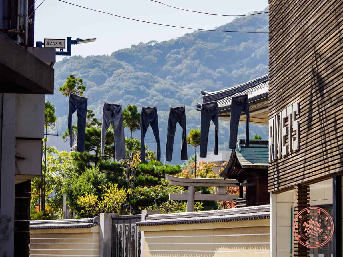 kojima jeans street with hanging jeans