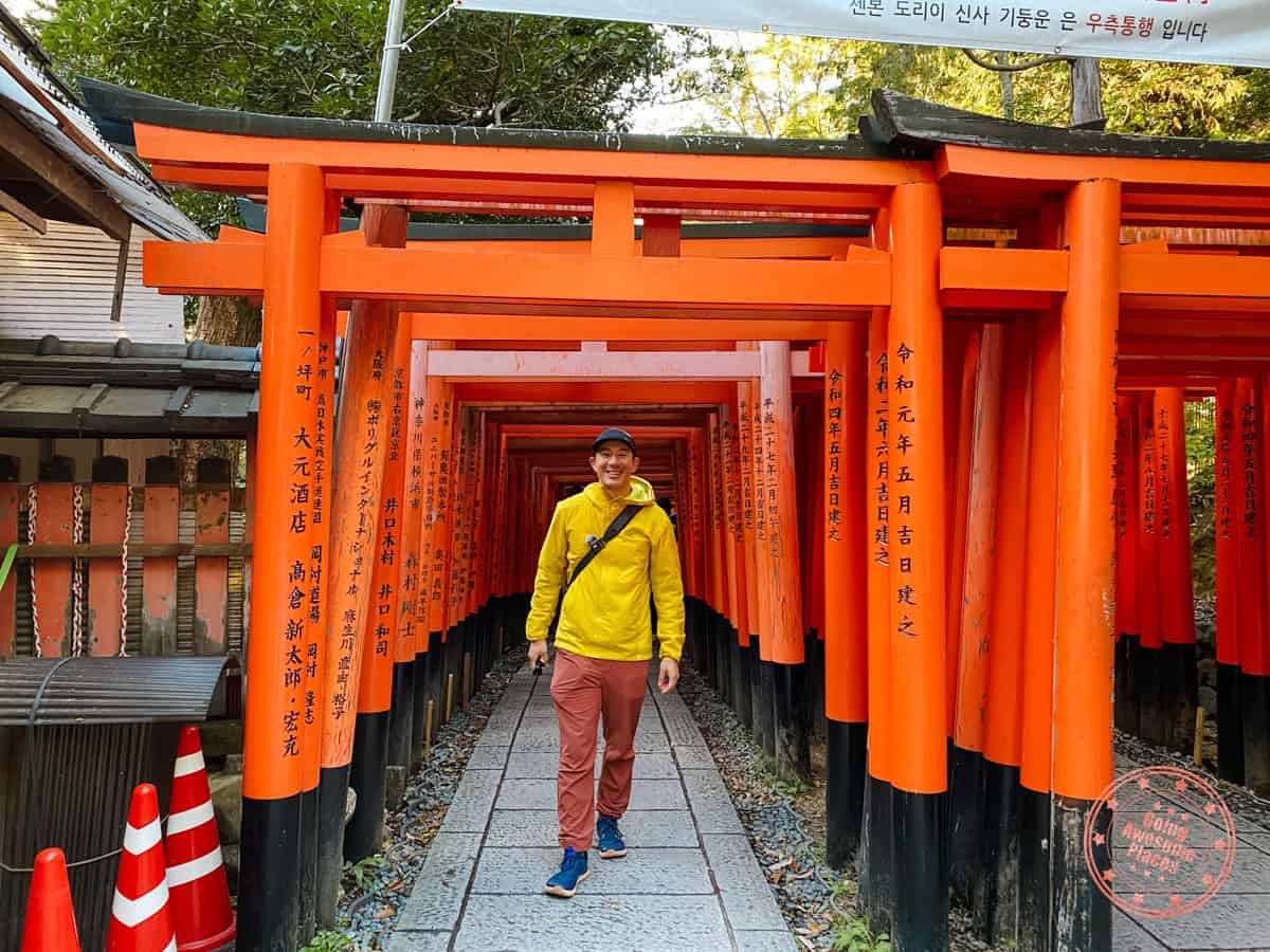 walking through the fushimi inari taisha shrine