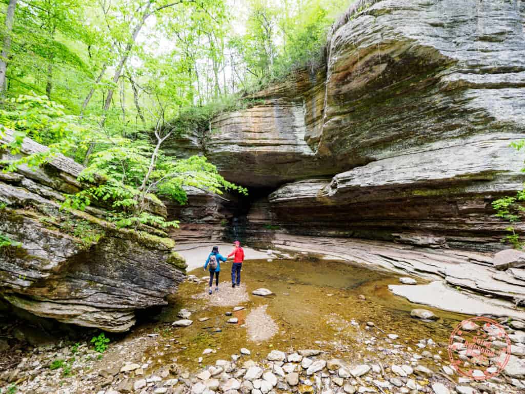 couple hiking in the lost valley trail nature in arkansas
