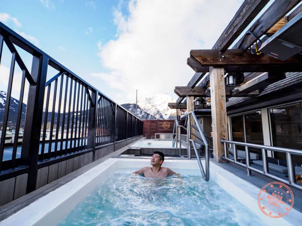 asian man in mount royal hotel rooftop hot tub