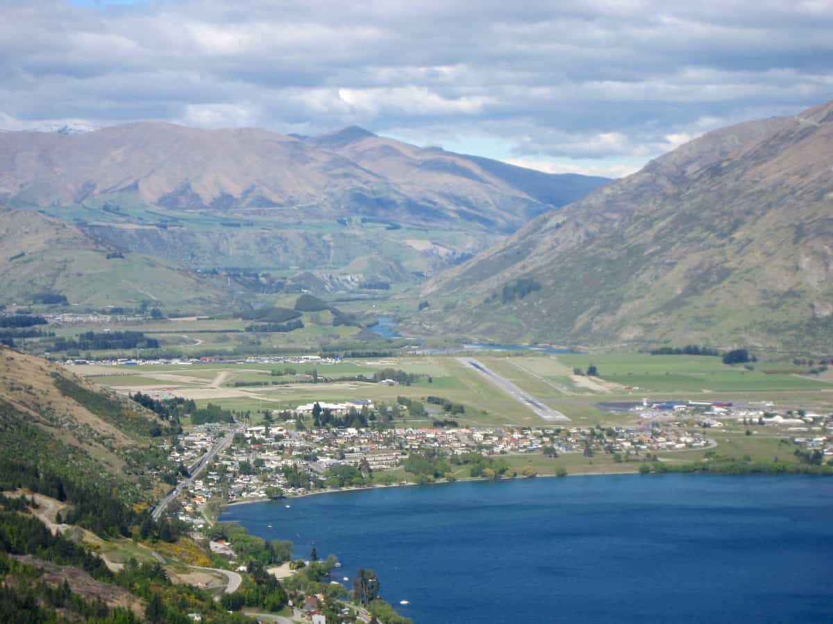 distant view over town in front of queenstown hill