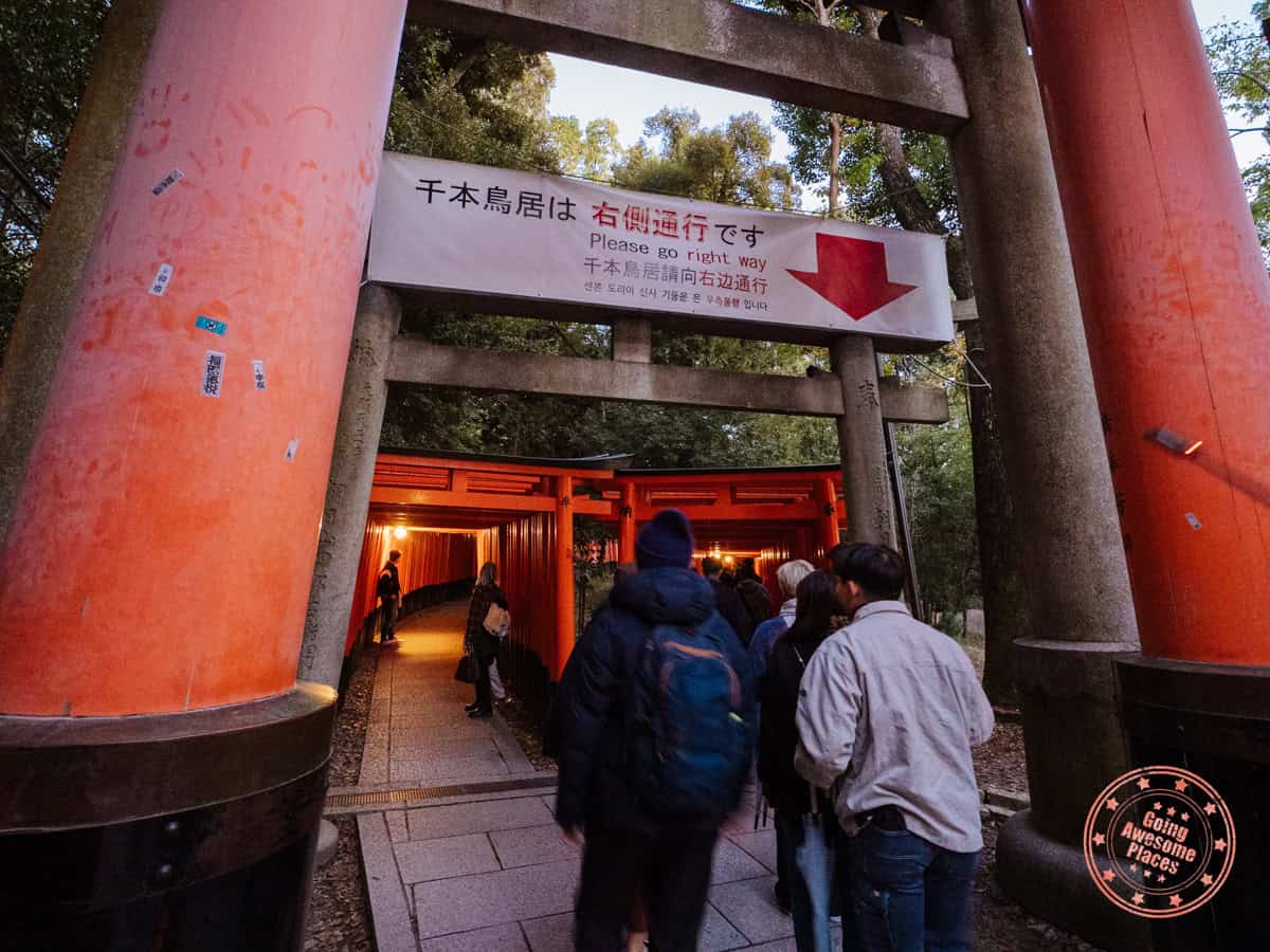 signage for the right one way path at fushimi inari shrine