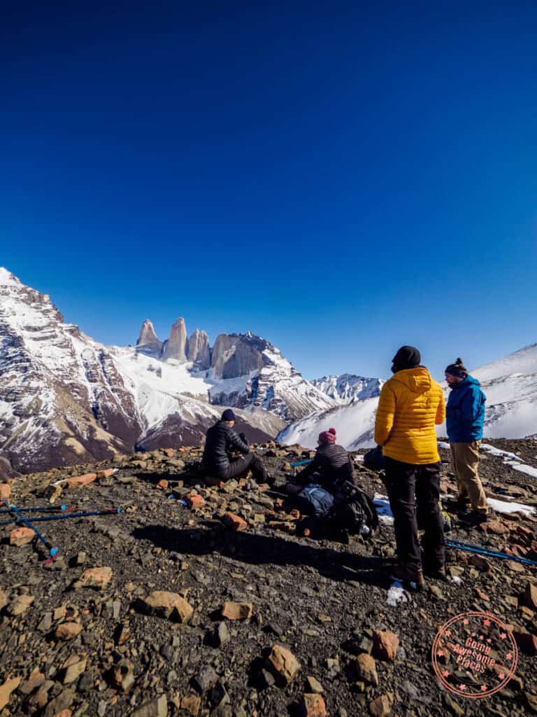 view at cerro paine summit with hikers and guides