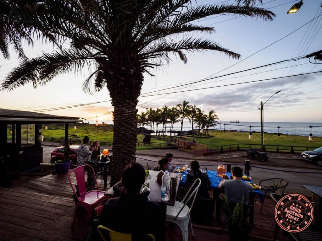 watching sunset from poco poco restaurant in hanga roa