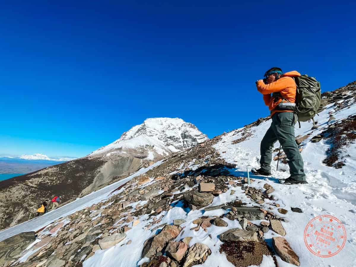 will from going awesome places taking a photo on the mountain in torres del paine patagonia chile