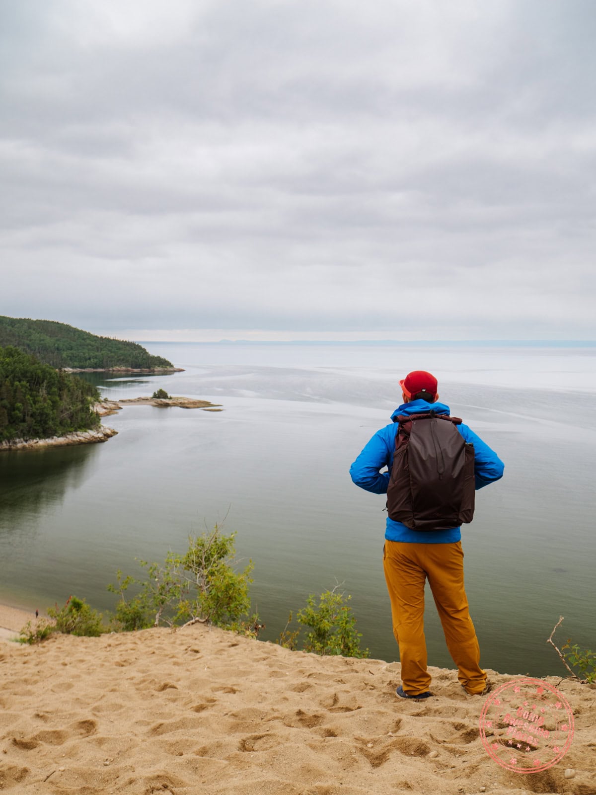 william tang standing with peak design outdoor line backpack at les dunes in tadoussac