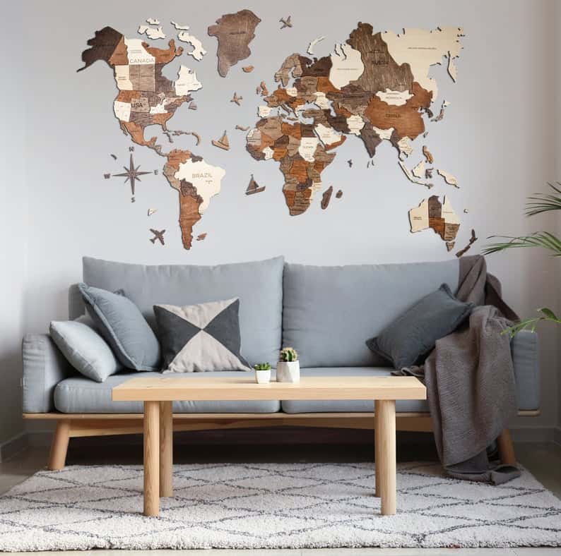 wood world map with pins in living room